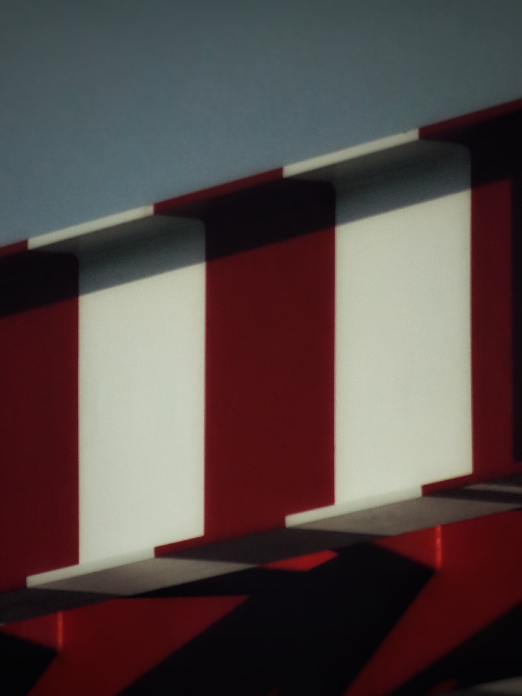 Red, white and black striped building facade study