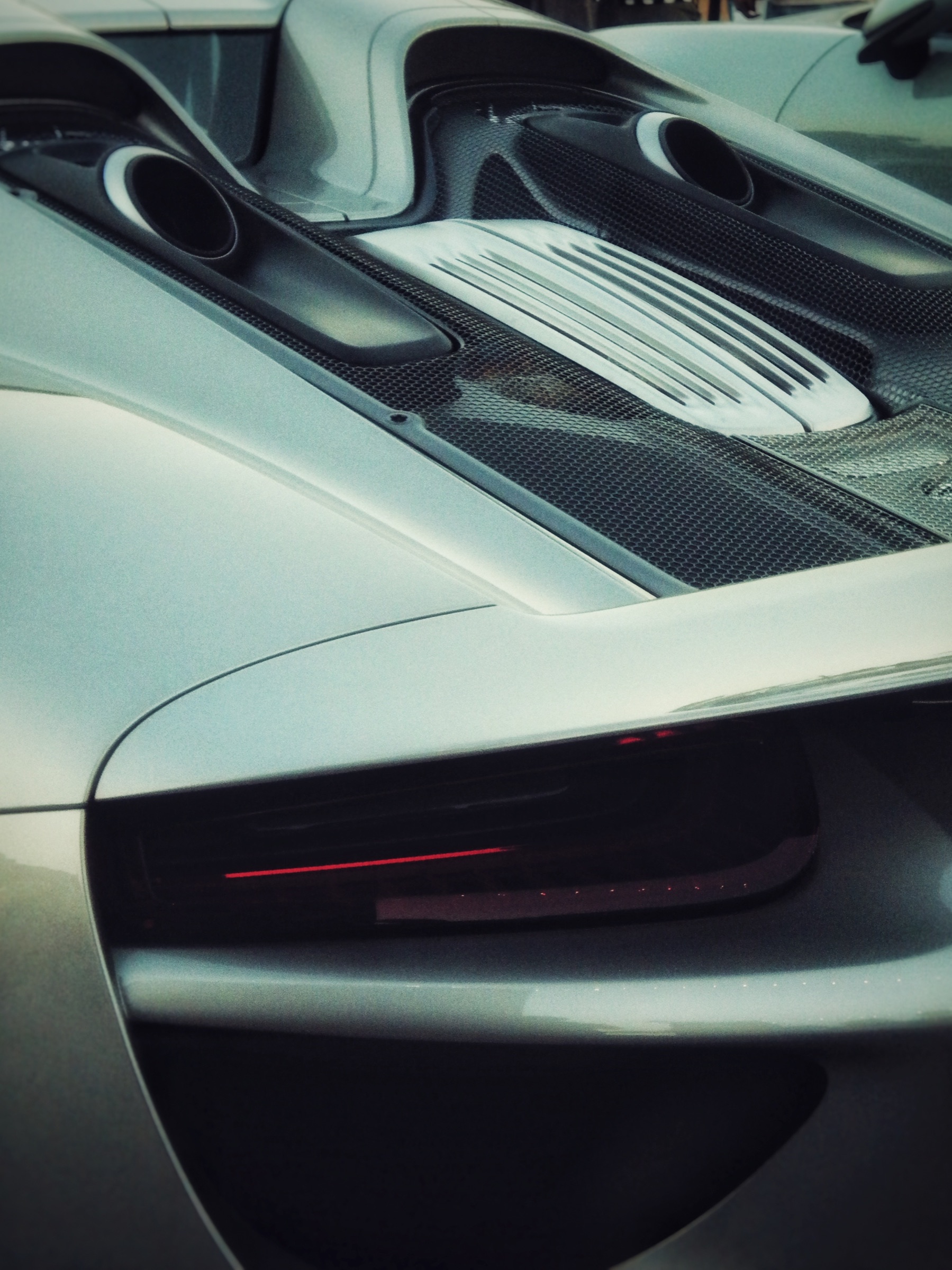 Macro study of a car's rear vents and taillight