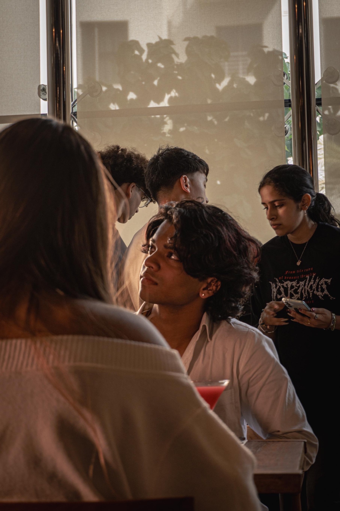 Cast and crew between takes on the set of When Eyes Meet